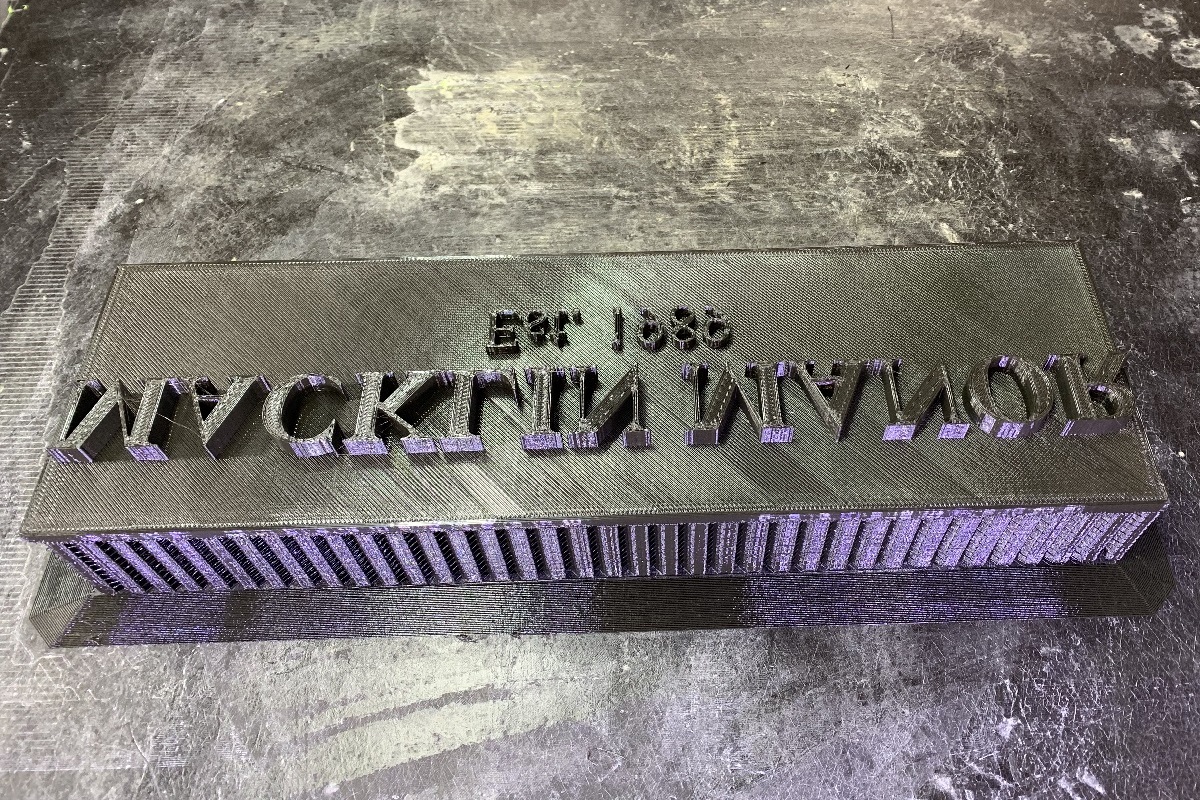 The 3D printed stamp on a Gigabot 3D printer