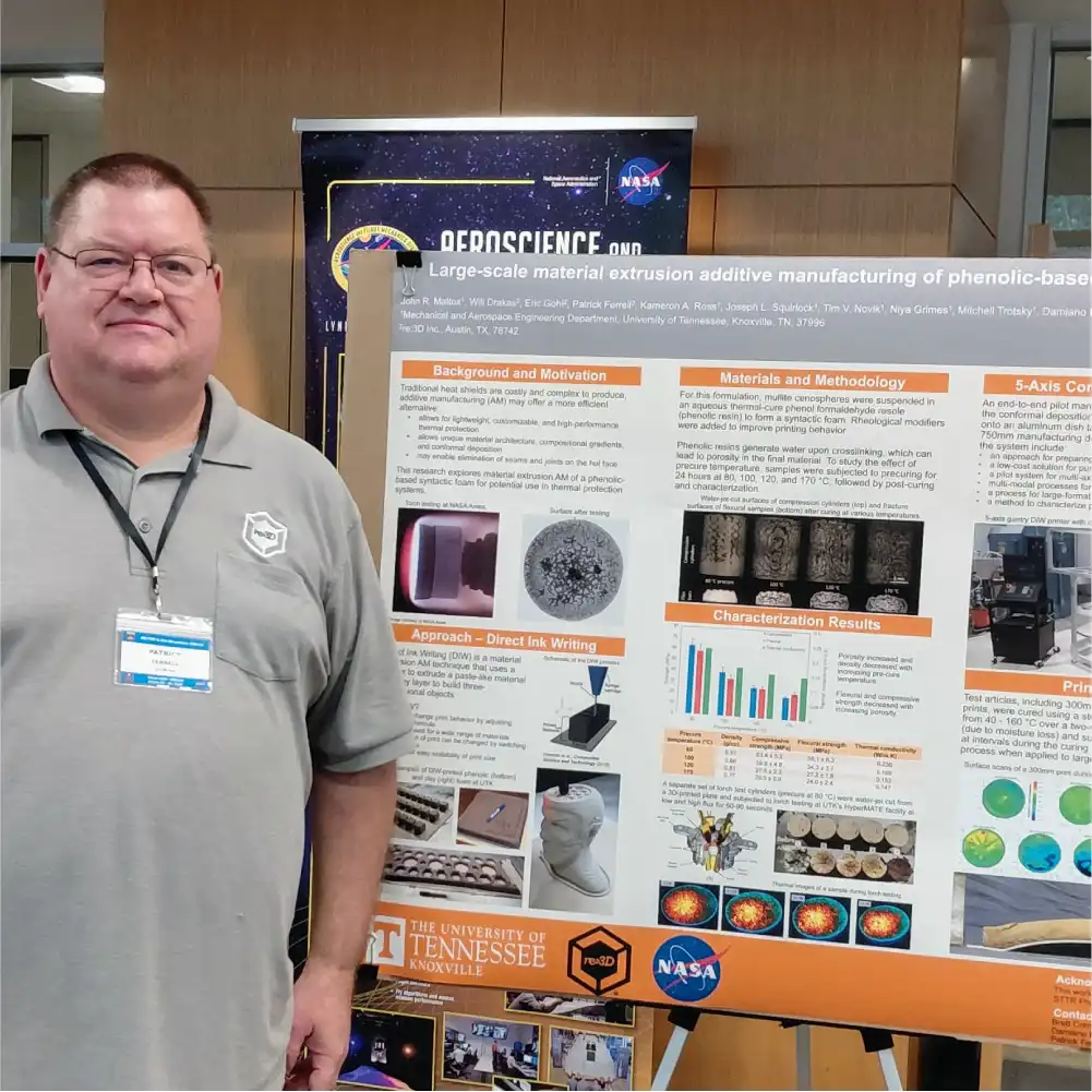 Figure: Patrick Ferrell with the team’s poster during a NASA Additively Manufactured Thermal Protection System (AM-TPS) Meeting at Texas A&M.