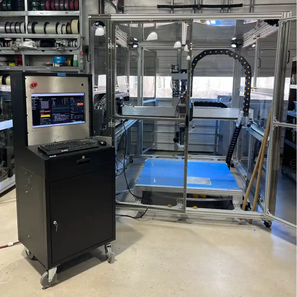 Figure: re:3D’s “Army Sequential” printer with control pedestal.