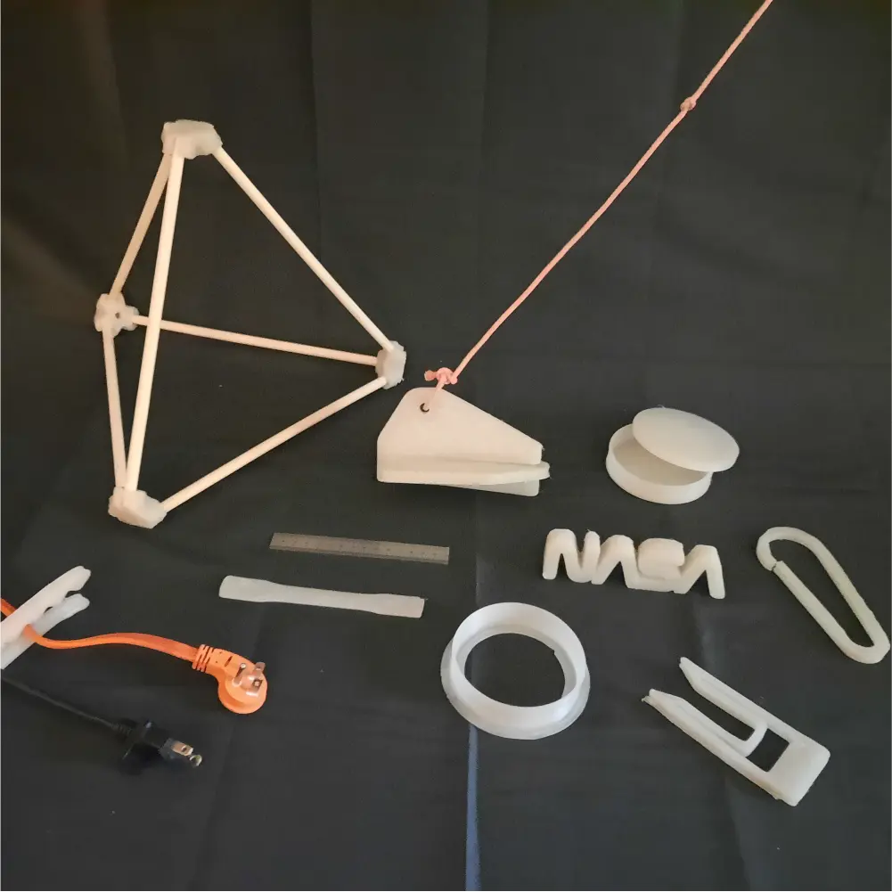 Figure: Example articles printed from logistics foam using the GigabotXS system.